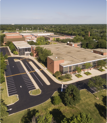 aerial view of a school and parking lot