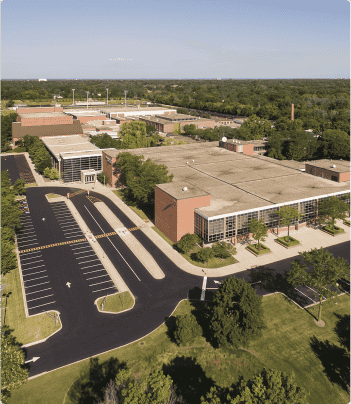 aerial view of a school and parking lot