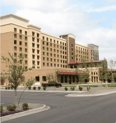 exterior of a tan hotel