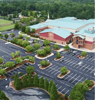 aerial view of a church and parking lot