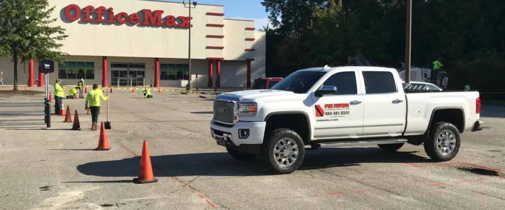 pks paving truck outside of an office max