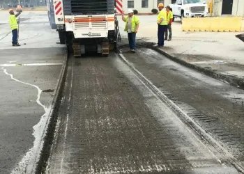PKS team paving a street