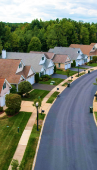 Property-Management.png row of houses in a suburb