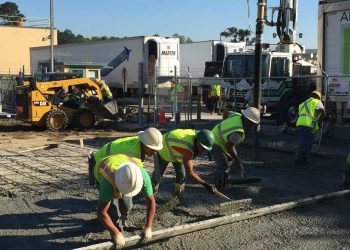 pks paving employees installing concrete