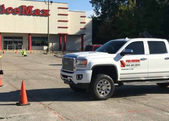 pks paving truck outside of an office max
