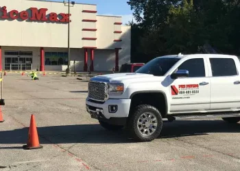 pks paving truck outside of an office max