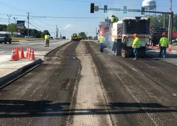 pks paving employees working on a street