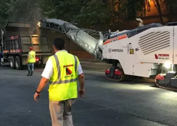 pks paving employees and a cold planer